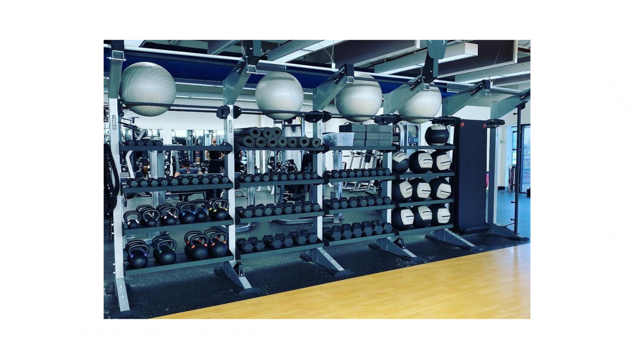 Torque Fitness 4 Bay Accessory Rack filled with Accessories.