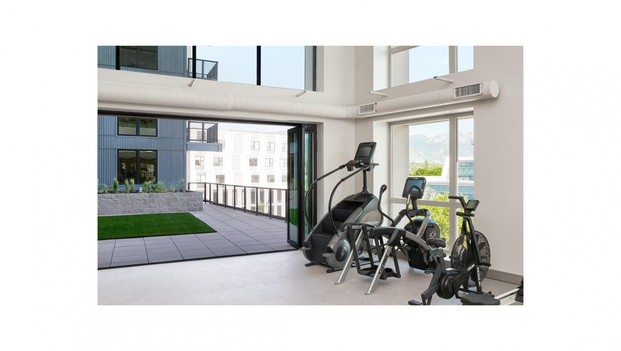 Avia Apartments cardio, True Fitness Palisade Step mill, Cybex 525 AT Total Body Arc Trainer.